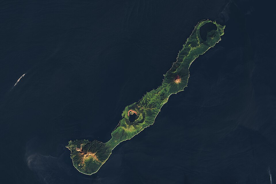 Today’s story is the answer to the January 2025 puzzler.
In the remote northwest corner of the Pacific Ocean, a dotted line of islands stretches between northern Japan and Russia’s Kamchatka Peninsula. The Kuril Archipelago is sparsely populated by humans but riddled with volcanoes.
The Zavaritskogo