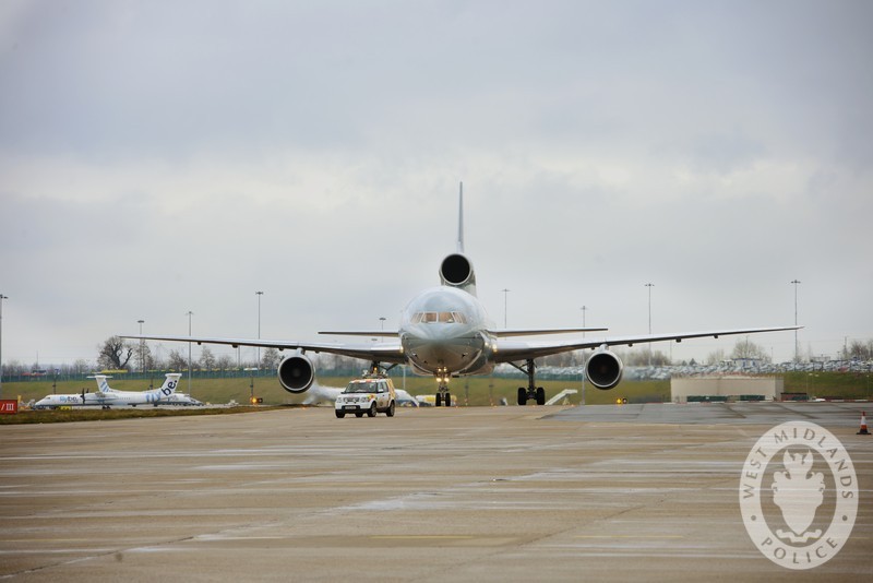 11.24 - The military plane carrying the 21-year-old army man, injured whilst serving in Afghanistan, touches down at Birmingham International Airport. Flights bringing services personnel back to the UK for treatment are known as ‘repatriation’ flights.
A POLICE convoy transfers an injured war hero t