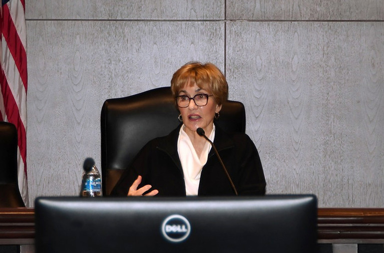 U.S. judge for the District Court for the District of South Carolina Cameron McGowan Currie behind a computer in a courtroom