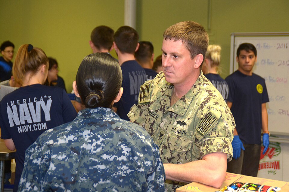 SAN ANTONIO – (Feb. 1, 2017) Fargo, N.D. native, Steel Worker 1st Class Andrew Hagemeier, a recruiter assigned to  Navy Recruiting Station Northeast San Antonio, speaks with his leading chief petty officer, Chief Navy Counselor Isabel Laurel during a bi-weekly Delayed Entry Program (DEP) meeting hel