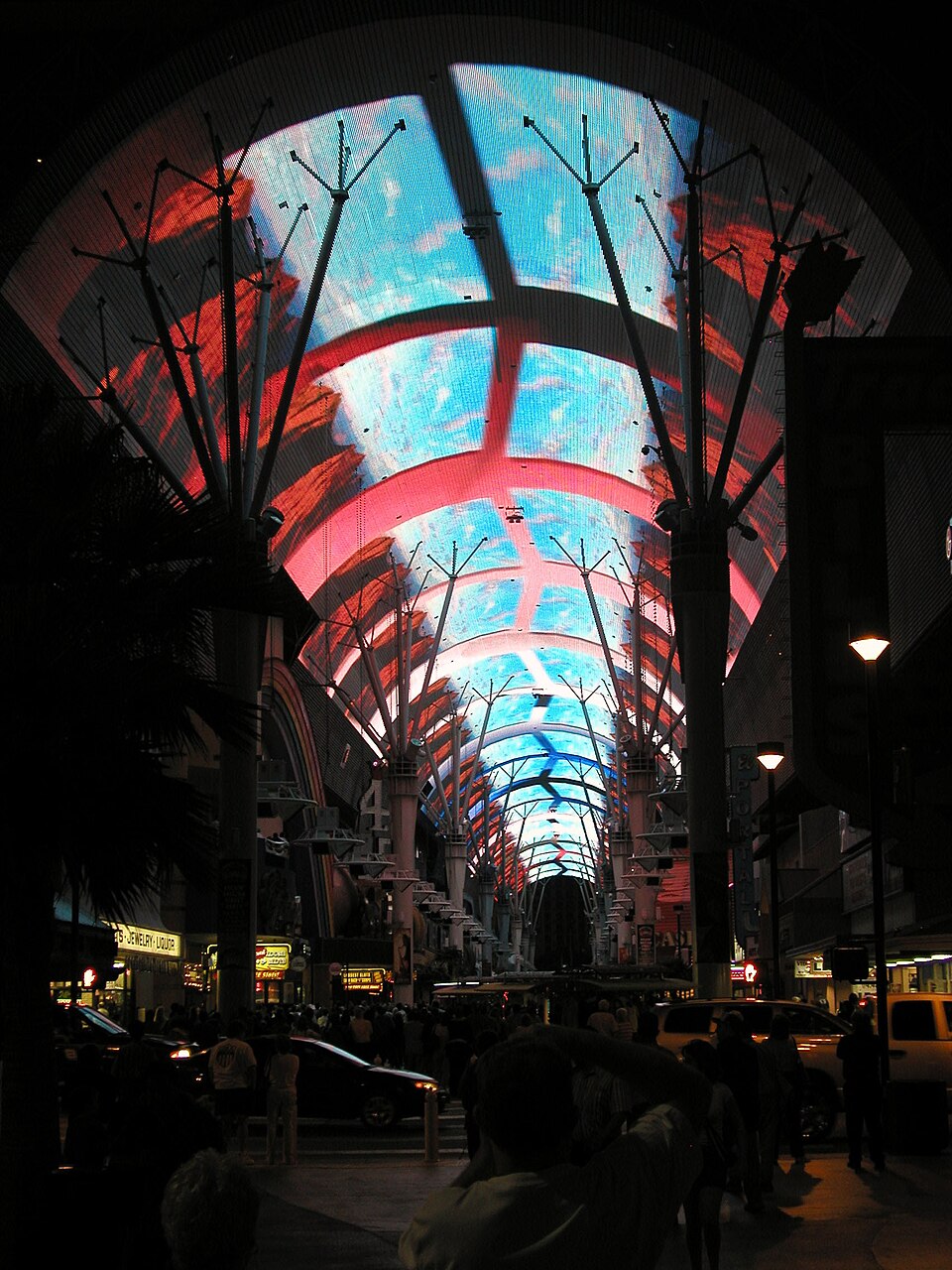 Scope and content:  The original finding aid described this photograph as:
Original Caption: The ever-present neon lights are turned off momentarily for this light show at Freemont.
Location: Nevada (36.171° N 115.145° W)

Status: Public domain. Las Vegas City Files