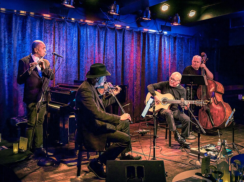 Guitarist Gil Gutiérrez performs with Oriente Lopez on flute, Bob Stern on violin, and Dave Rodriguez on double bass at New York's premier jazz club Birdland. Photo; John Kisch