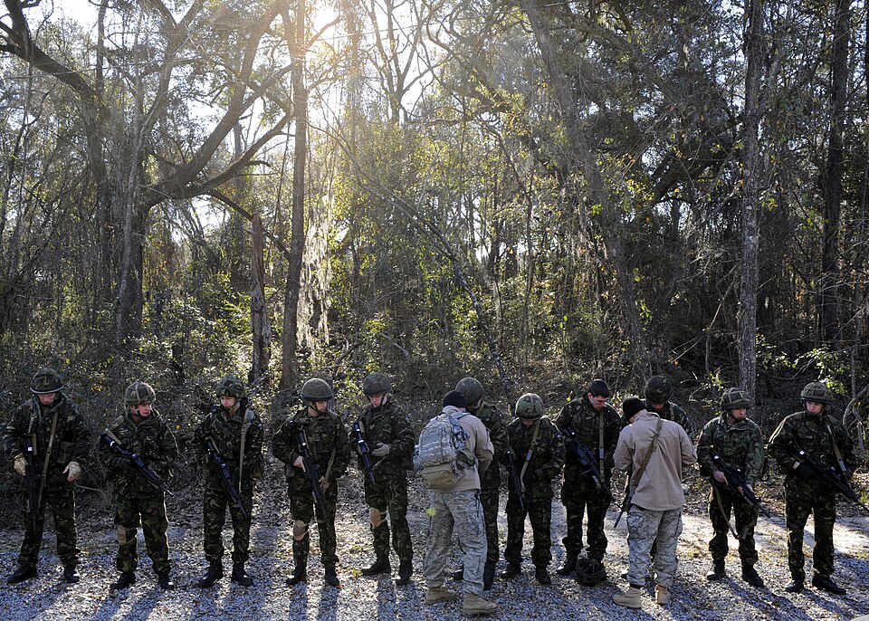 Personnel from the II Squadron, Royal Air Force Regiment from RAF Honington receive instructions from U.S. Air Force Airmen of the 820th Security Forces Group on proper procedures while clearing a house in a Military Operations in Urban Terrain Village at Moody Air Force Base, Ga., Feb. 4, 2009. The