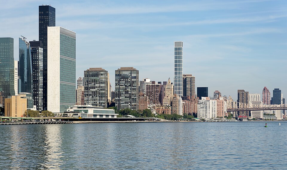 Shore of the East River with Headquarters of the United Nations (on the left), New York City