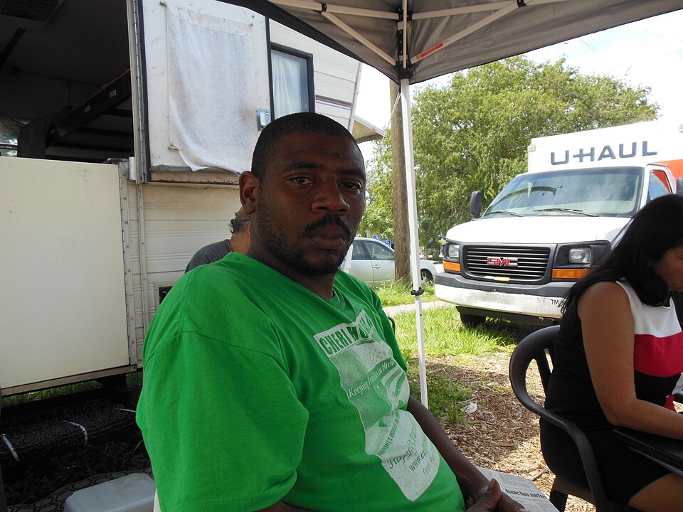 Shamako Noble is Executive Director of The Hip Hop Congress and currently personal assistant to Green Party VP candidate Cheri Honkala. He didn’t sleep in a tent or rely Romneyville’s porta johns or its converted  old  school bus kitchen. But he spend hours there each day during the events that coun