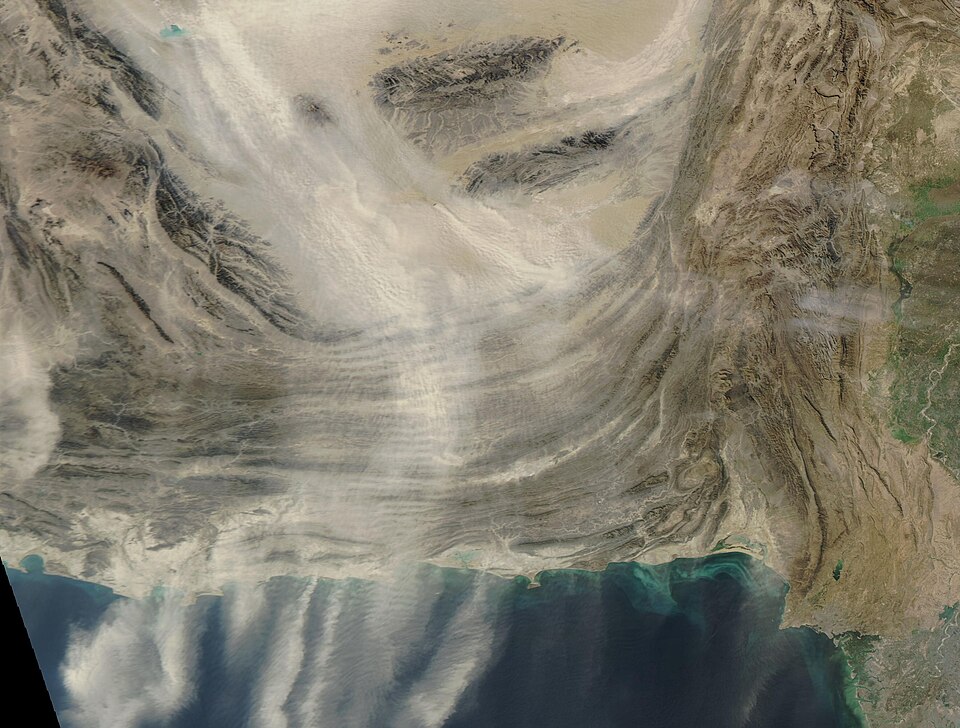 Strong north winds swept clouds of dust across southern Afghanistan, Pakistan, eastern Iran, and southward over the Arabian Sea on December 3, 2024. The Moderate Resolution Imaging Spectroradiometer (MODIS) on NASA’s Aqua satellite acquired this true-color image of massive waves of moving dust on th