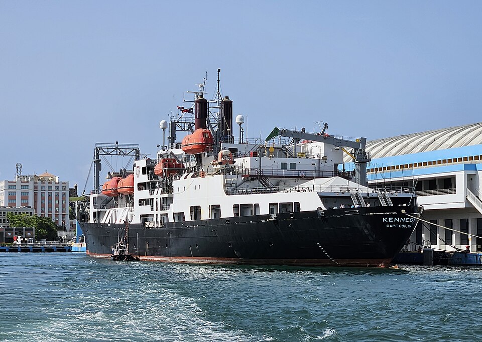 Kennedy in Texas A&amp;M insignia moored to Pier 4 (cruise terminal) with pilot disembarking in San Juan Harbor, San Juan, Puerto Rico (July 2023)