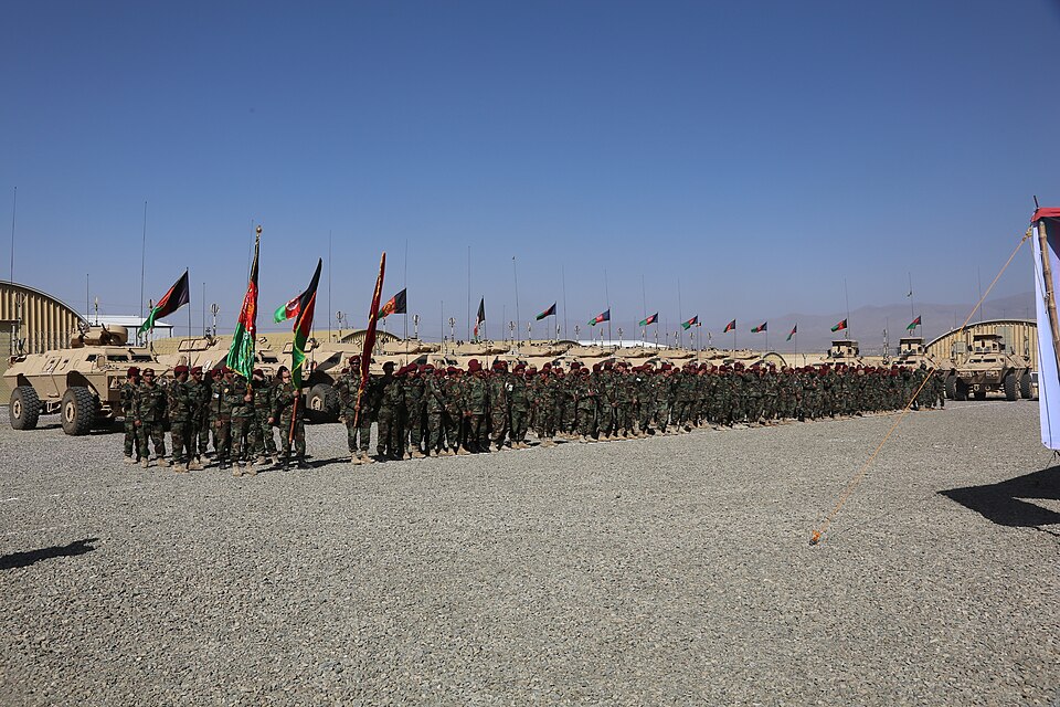 Afghan National Army soldiers with 1st Special Operations Brigade stand in formation Aug. 20, 2013, during the brigade's opening ceremony at Forward Operating Base Thunder in Paktia province, Afghanistan.