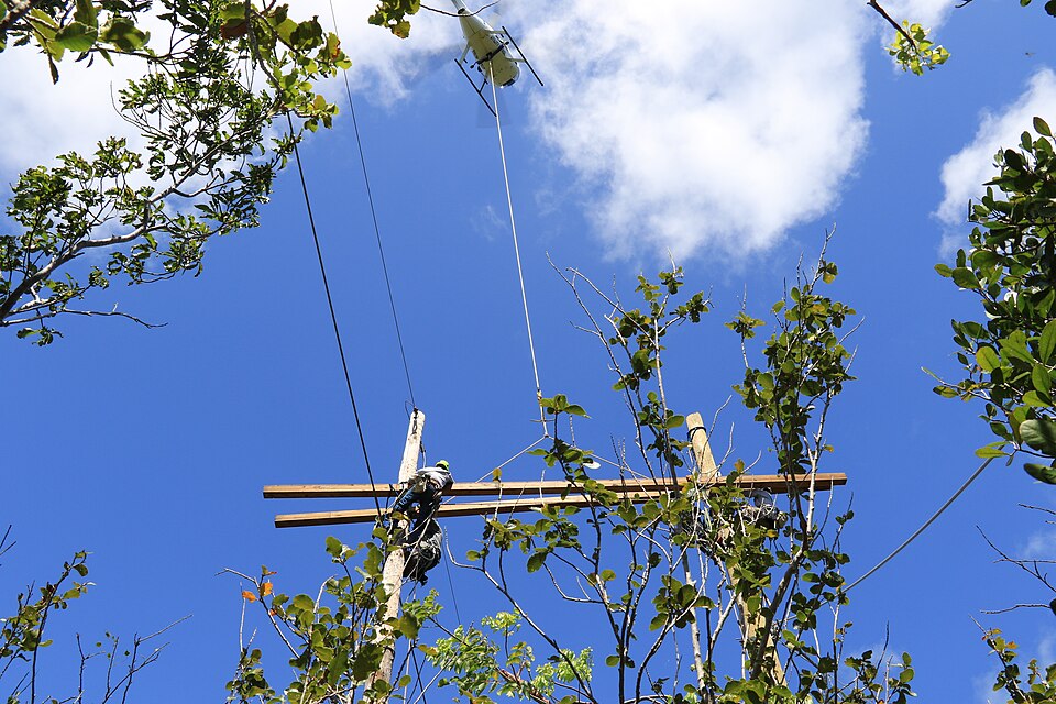 U.S. Army Corps of Engineers Task Force Power Restoration contractors complete work on a transmission line in the Guanica State Forest, Puerto Rico, April 6. The line connects the Costa Sur Power Plant in Ponce to Mayaguez. Mayaguez is the eighth-largest municipality in Puerto Rico. The repairs stab
