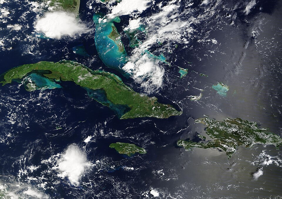 Scattered clouds surrounded several emerald-green Caribbean Islands on September 19, 2024, when the Moderate Resolution Imaging Spectroradiometer (MODIS) on NASA’s Terra satellite acquired this true-color image.
The Caribbean Sea is a tropical arm of the Atlantic Ocean, stretching across about 1,063