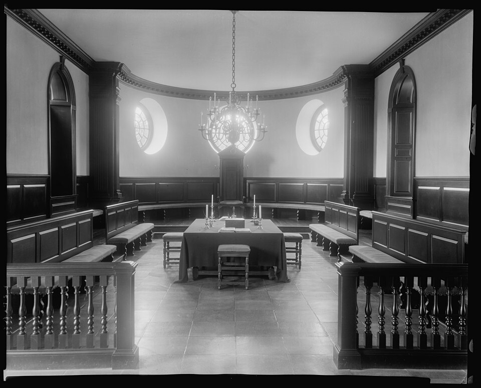 Black and white photographic view of the chamber of the House of Burgesses in the Capitol at Williamsburg, Virginia, James City County, by the American photographer and photojournalist Frances Benjamin Johnston. Dated ca. 1930-1939. From the archives of Frances Benjamin Johnston, which she donated t