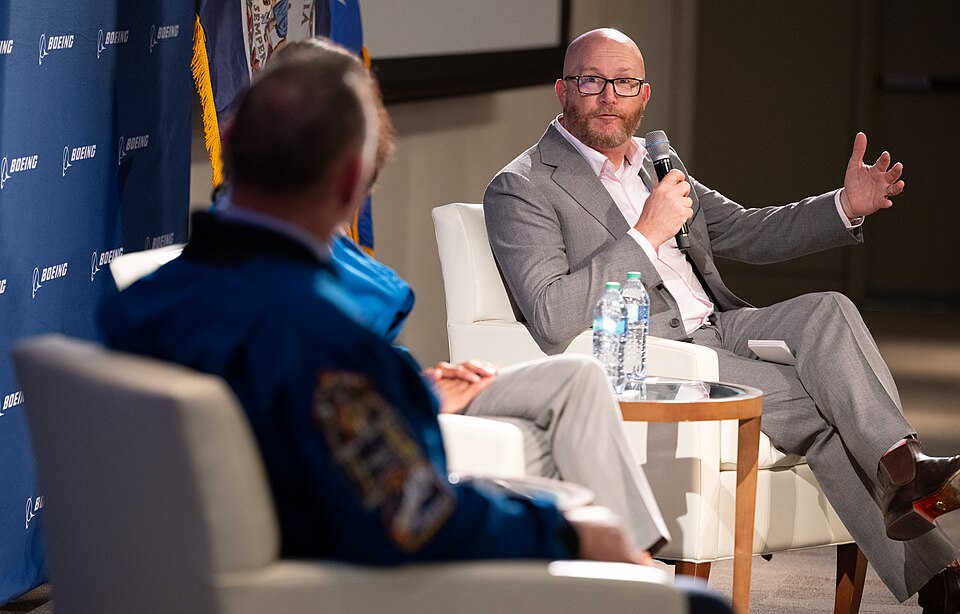 Steve Parker, executive vice president, president and CEO of Boeing Defense, Space and Security, speaks with NASA astronauts Suni Williams and Butch Wilmore during an event with employees of Boeing, Wednesday, Sept. 17, 2025, at the company’s headquarters in Arlington, Va. Williams and Wilmore launc