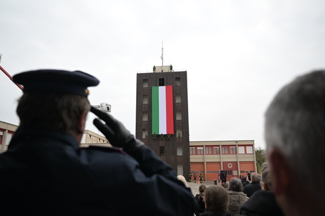 The Pordenone fire department team repel down a building to display the Italian flag during the celebration of their patron saint, Saint Barbara, at Pordenone, Italy, Nov. 4, 2024. The 31st Fighter Wing celebrates alongside our Italian counterparts and prioritizes strengthening partnerships with our