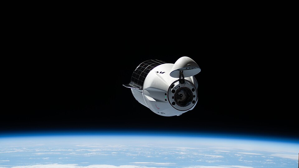 iss073e0519825 (Aug. 25, 2025) --- A SpaceX Dragon cargo spacecraft with its nosecone open and carrying over 5,000 pounds of science, supplies, and hardware for NASA's SpaceX CRS-33 mission approaches the International Space Station for an automated docking to the Harmony module's forward port. Both
