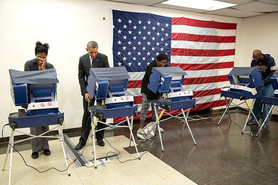 Oct. 20, 2014
"It was supposed to be just a simple early voting by the President at the Martin Luther King Jr. Community Center in Chicago, Illinois. When Aia Cooper, left, and her fiancé Mike Jones, far right, walked by to also cast their ballot, Jones quipped, 'Mr. President, don't touch my girlfr