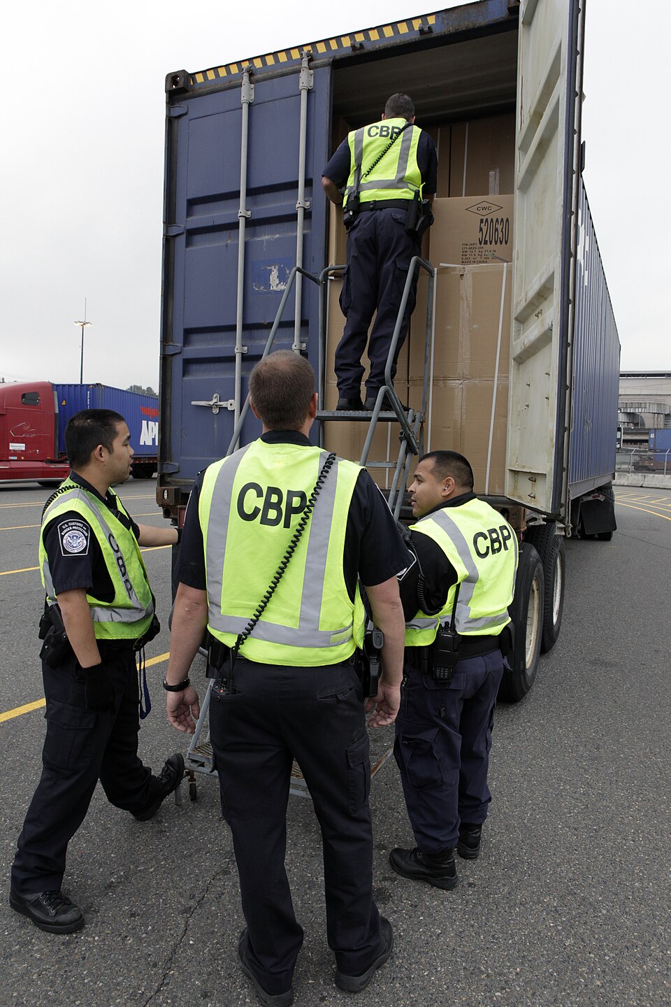US Customs and Border Protection Field Officers conduct inspection of vehicles at a port of entry in Seattle, Washington.
Photographer: Donna Burton