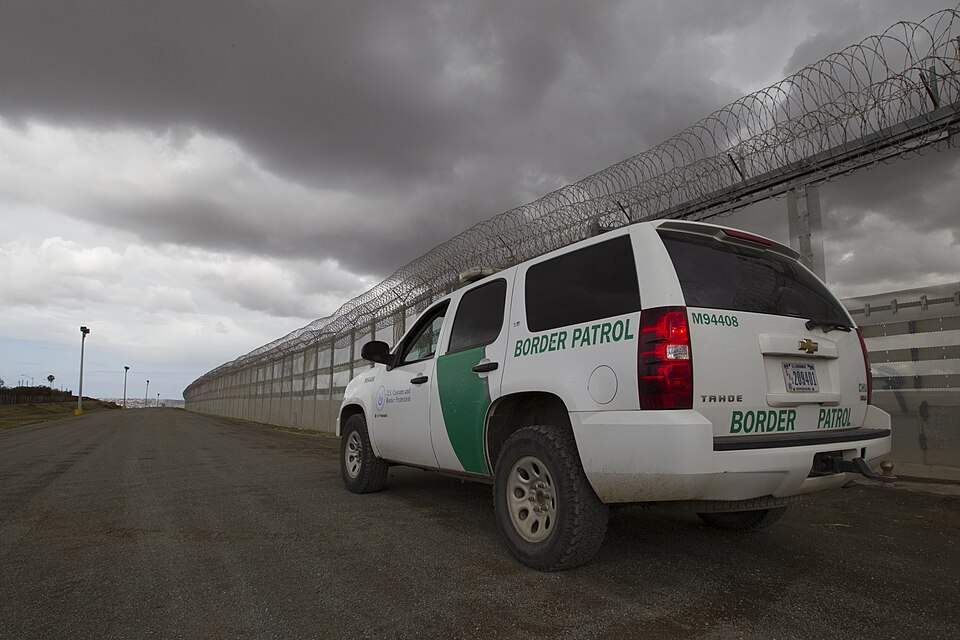 A Border Patrol vehicle sits along the border fenceline separating San Diego and Tijuana Mexico watching for illegal crossings in March 2016. The border fence between San Diego and Mexico is a deterrent to illegal immigration, drug smuggling and human trafficking. The fence is regularly patrolled by