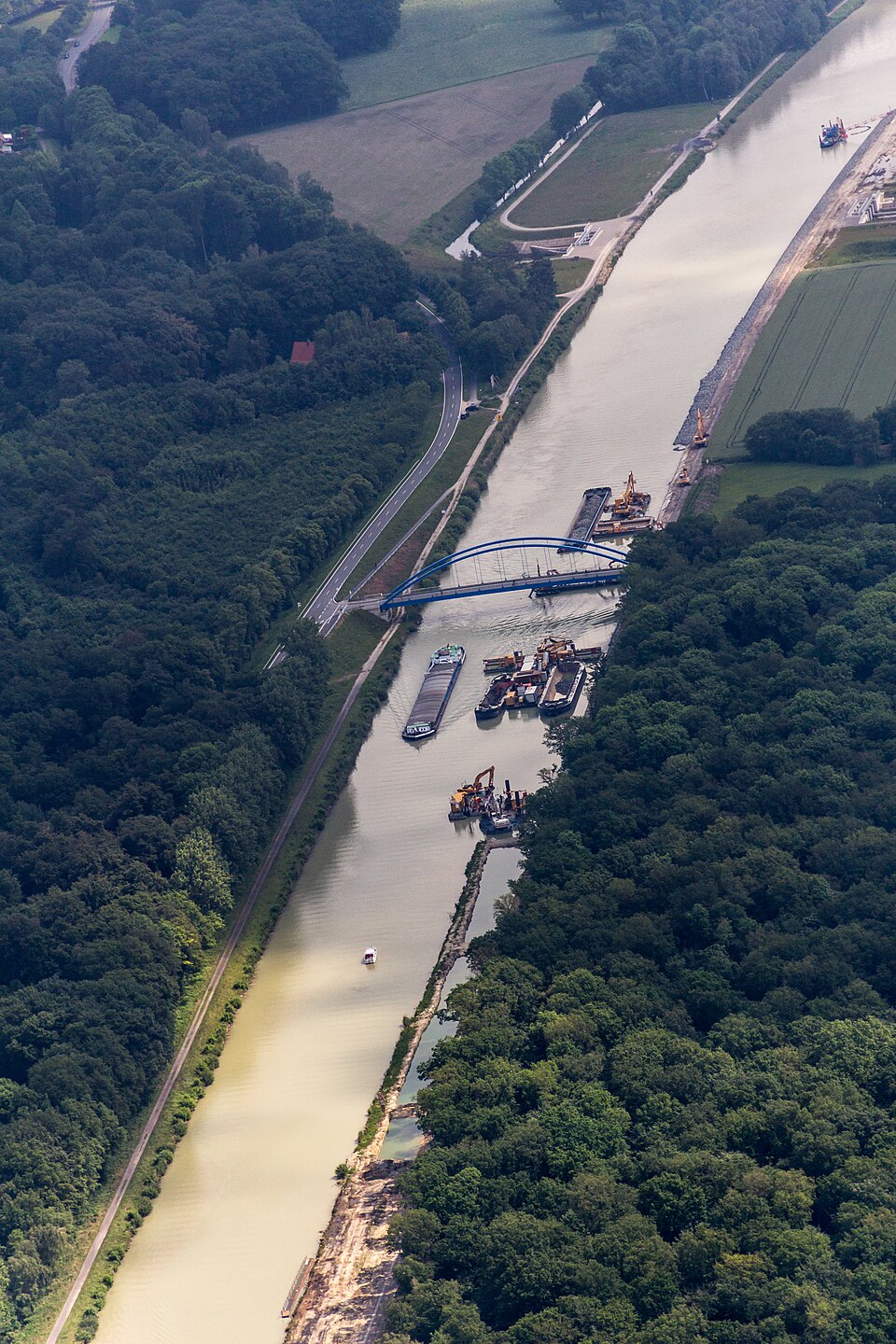 Dortmund–Ems Canal near Senden, North Rhine-Westphalia, GermanyThe idea of connecting the industrial conurbation of the Ruhr region with a navigable waterway to the North Sea, namely the seaport of Emden, arose in the 19th century because the rapidly growing volume of freight traffic was overloading