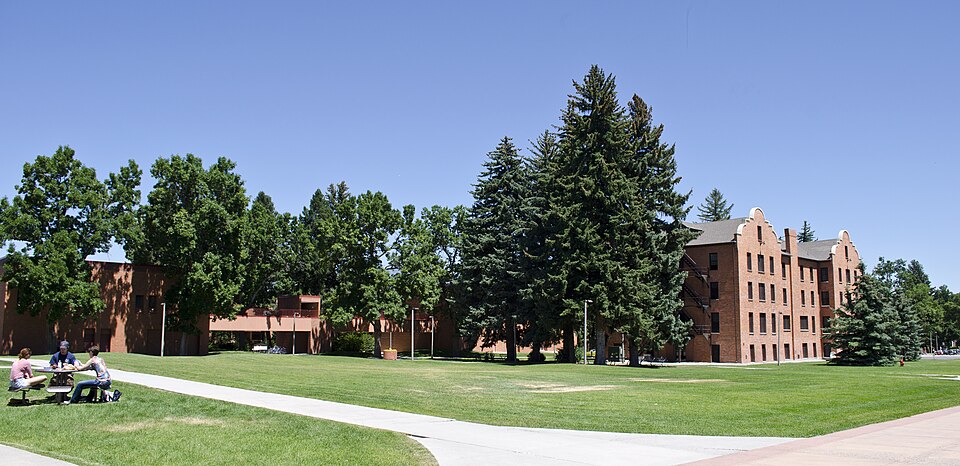 Looking northeast at the bridge connecting the wings of Wilson Hall (left) and Hamilton Hall (right) on the campus of Montana State University in Bozeman, Montana.
Wilson Hall was constructed in 1976. It is named for Milburn Wilson, a professor of agricultural economics at Montana State from 1914 to