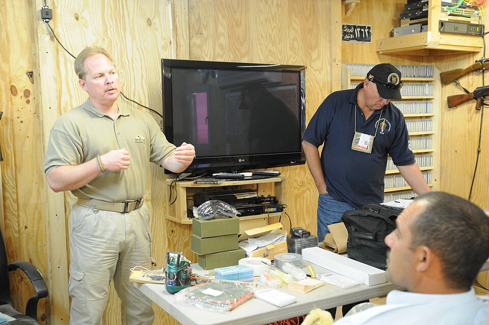 David Bennett, a member of the International Police Advisors, explains some of tools used in the collection of evidence to the Iraqi police counter explosive team from Tikrit during a Crime Scene Investigation class on Contingency Operating Base Speicher in Tikrit, Iraq on May 9.