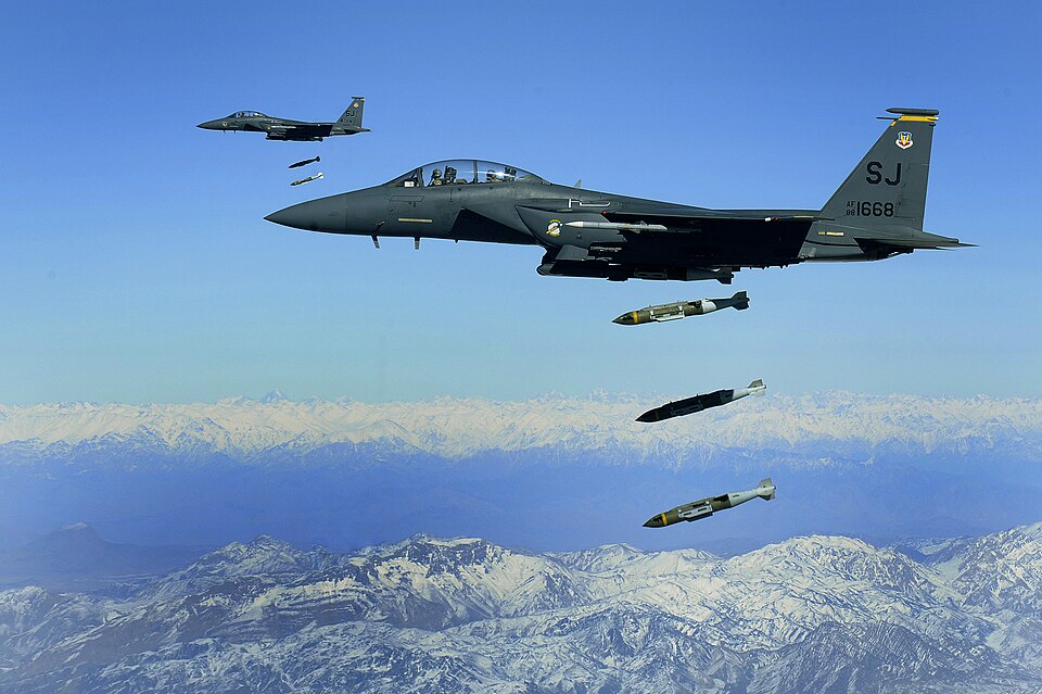 U.S. Air Force F-15E Strike Eagle aircraft from the 335th Fighter Squadron drop 2,000-pound joint direct attack munitions on a cave in eastern Afghanistan Nov. 26, 2009. The 335th is deployed to Bagram Airfield, Afghanistan, from Seymour Johnson Air Force Base, N.C.