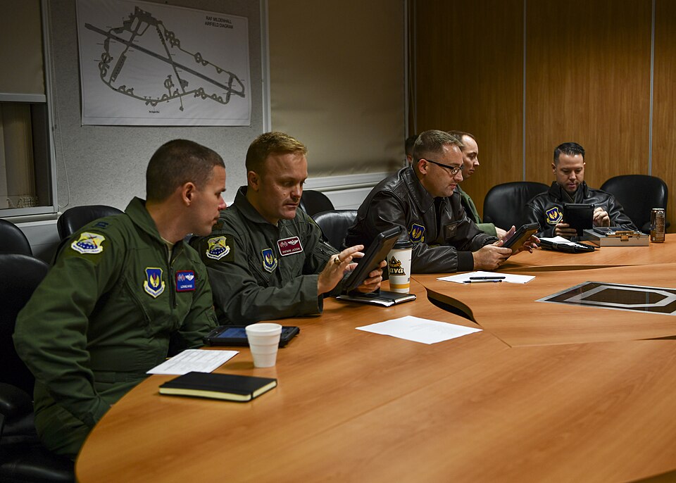 Airmen of the U.S. Air Force 100th Air Refueling Wing begin their pre-flight briefing during Bomber Task Force Europe 20-1 while deployed to RAF Mildenhall, United Kingdom, Nov. 6, 2019. This BTF is the global employment of U.S. strategic bombers, nuclear and conventional, providing strategic milita