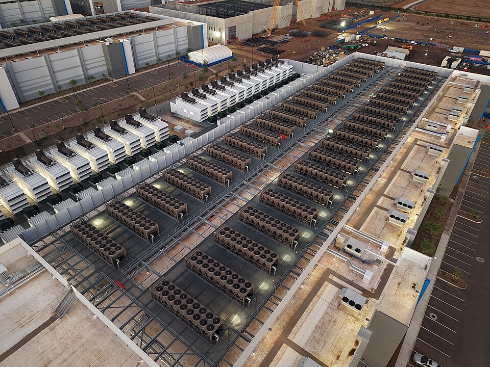 Roof of a data center featuring cooling towers and backup generators