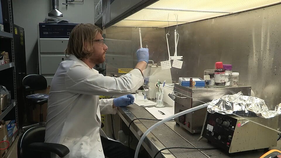 This is a frame of a video. Description for the video:
"Stanford and Oxford scientists have created novel solar cells from crystalline perovskite that could rival and even outperform existing silicon cells on the market today. The new design converts sunlight to electricity at efficiencies of 20 per