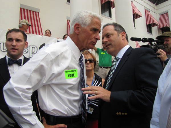 Accompanying note: "Governor Charlie Crist, left, listening to former Tallahassee Mayor Scott Maddox on the steps of the Old Capitol moments before a special legislative session convened to consider the governor's proposal for a constitutional amendment banning offshore oil drilling. Lawmakers rejec