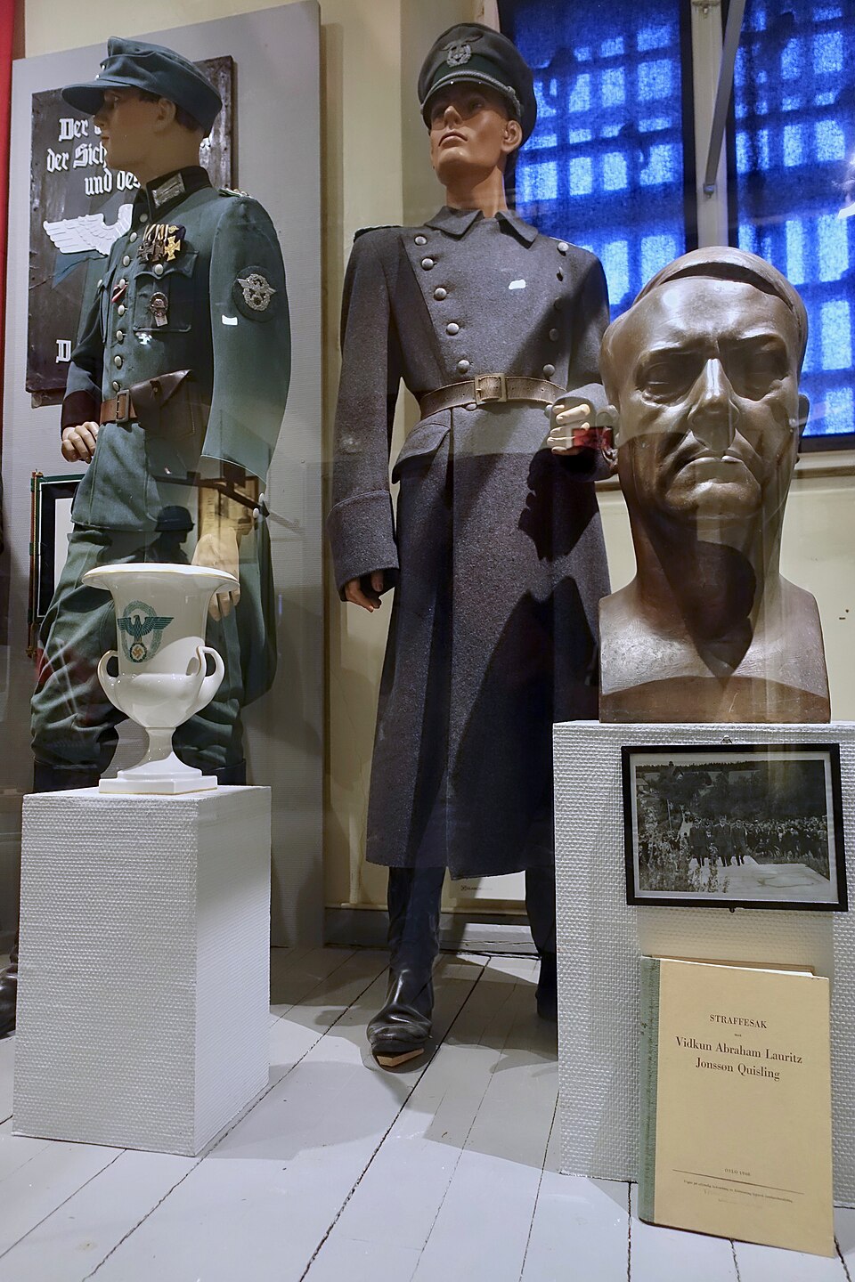 Police uniforms and misc. items from the German occupation of Norway during World War II 1940 – 1945, on display in the exhibitions of Norwegian National Museum of Justice in Trondheim, Norway (Norwegian: Justismuseet (i det tidligere Kriminalasylet). Photo taken in April 2019.
National flag and mar