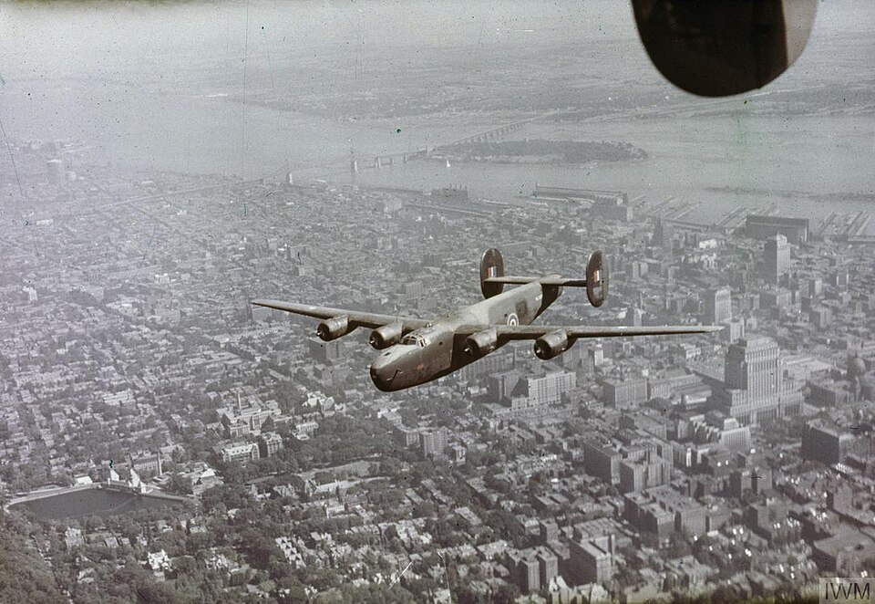 Royal Air Force Transport Command Aircraft Over Montreal, May 1944
A Consolidated Liberator, AL627 of the Ferry Command Unit of RAF Transport Command flying over Montreal, nearing the end of a flight from Prestwick.