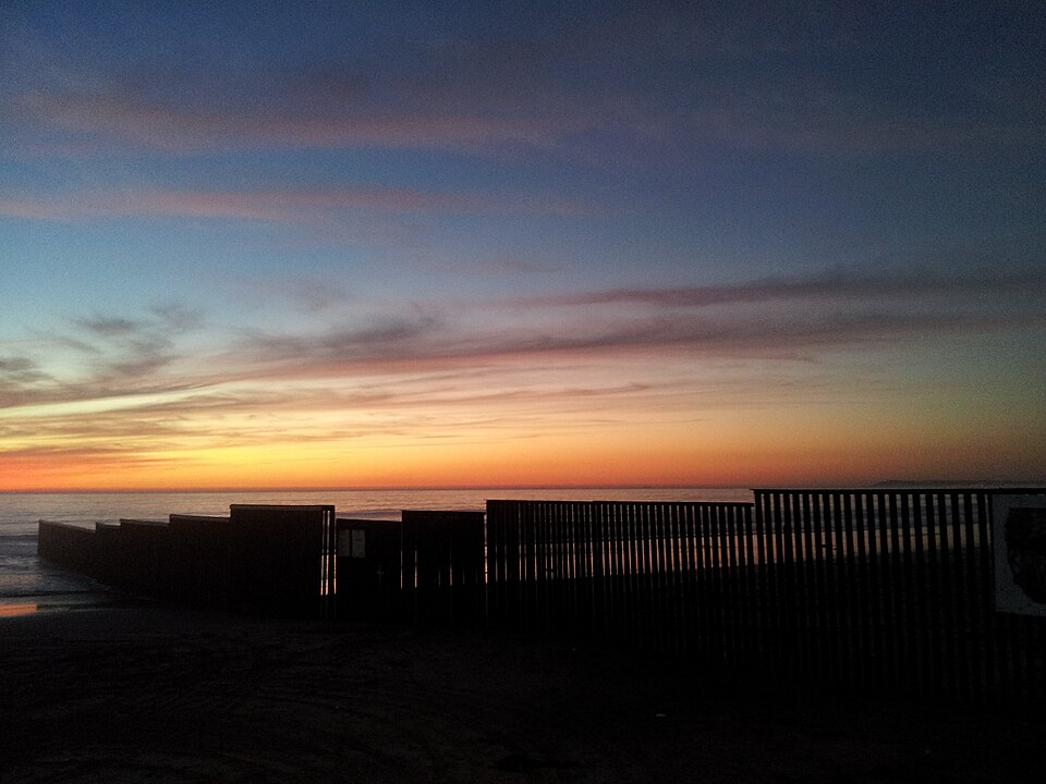 Sunset at Playas de Tijuana, overlooking the border fence.