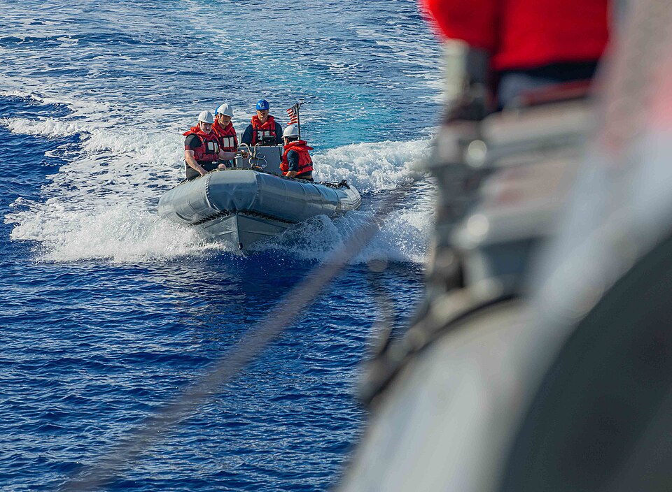 230705-N-NY362-1019 PHILIPPINE SEA (July 5, 2023) Sailors assigned to the Arleigh Burke-class guided-missile destroyer USS Howard (DDG 83) conduct search and rescue training during Pacific Vanguard 23 in the Philippine Sea, July 5. Pacific Vanguard is an opportunity for the four Indo-Pacific navies 