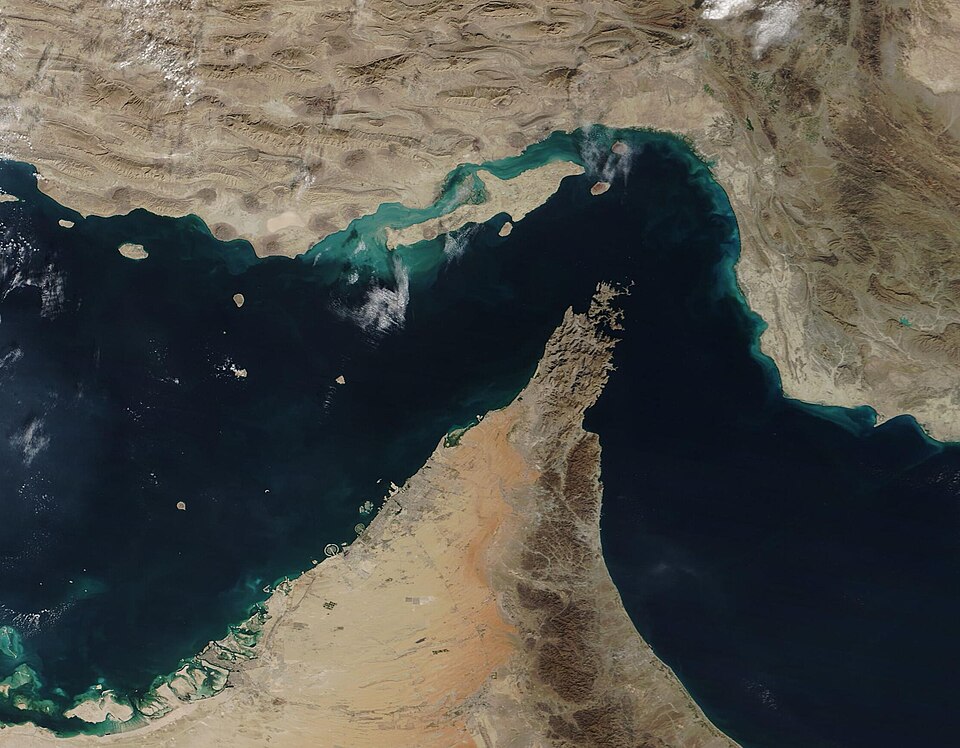 The narrow Strait of Hormuz lies between the Persian Gulf and the Gulf of Oman, separating Iran (north) from the Arabian Peninsula (south). Only about 21 miles (34 km) wide at the narrowest point and roughly 96 miles (155 km) long, about thirty percent of the world’s seaborne oil and nearly one-quar