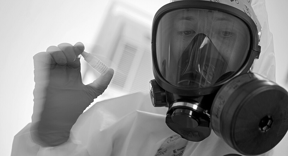 Staff Sgt. Daniel Burdick, 97th Medical Operations Support Squadron bioenvironmental engineering flight entry team member, runs a test on contaminants found in a simulated contaminated area as part of the all hazards chemical, biological, radiological and nuclear response (ACR) training, July 25. Th