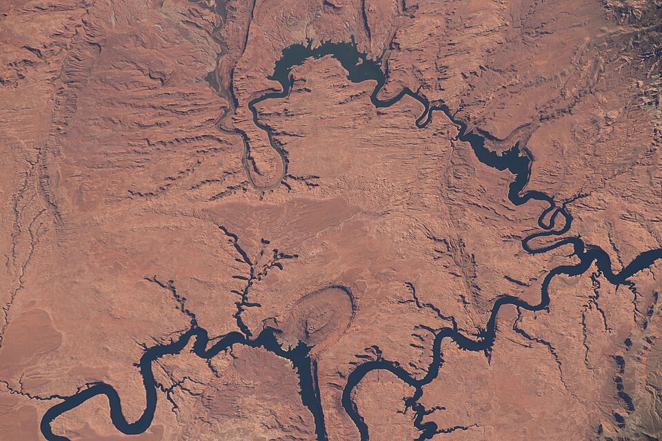 iss070e008779 (Oct. 20, 2023) -- As the International Space Station orbited 260 miles above Southeastern Utah, Lake Powell is seen winding through the rugged landscape of Glen Canyon National Recreation Area. As one of two water storage reservoirs for the Colorado River Basin, it stretches nearly 18
