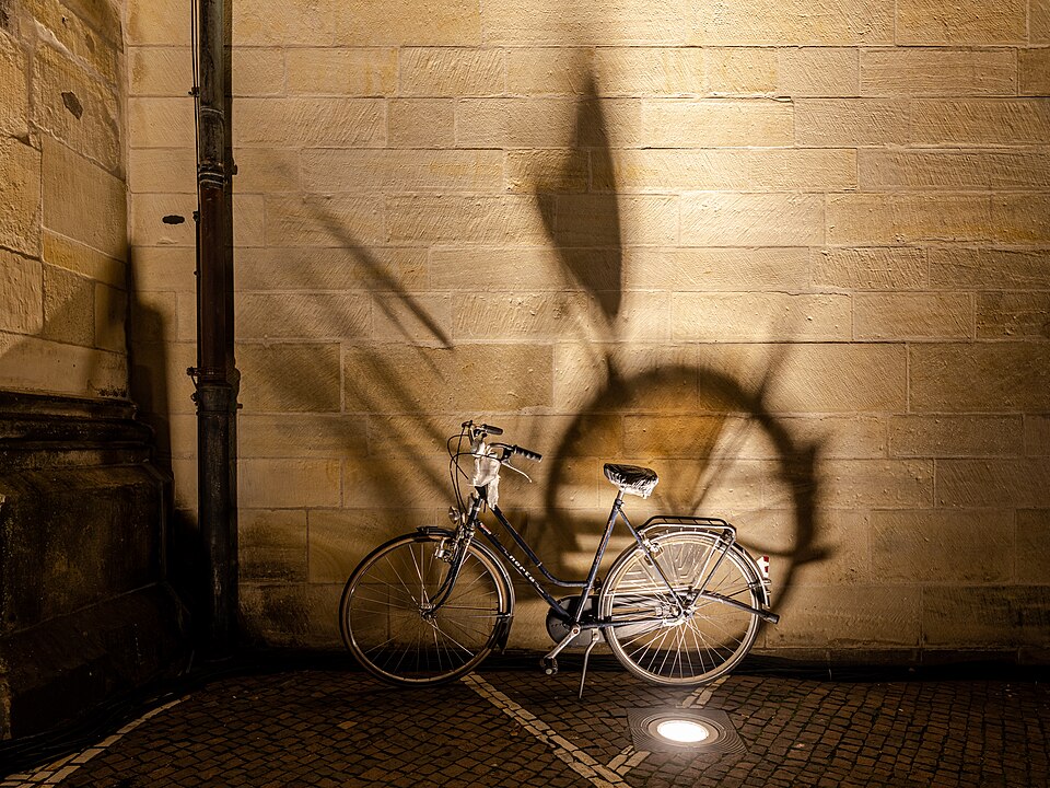 Bicycle at the St. Lamberti Church in Münster, North Rhine-Westphalia, GermanySt. Lamberti is a Roman Catholic parish church in Münster’s old town. It was built between 1375 and 1525 as a market and civic church and is located on Lambertikirchplatz and at the corner of Salzstraße and Prinzipalmarkt.