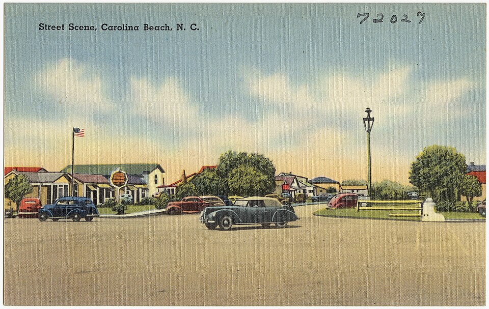 File name: 06_10_015803
Title: Street scene, Carolina Beach, N. C.
Created/Published: Pub. by E. C. Moore &amp; Co., Wilmington, N.C.; Tichnor Bros. Inc., Boston, Mass.
Date issued: 1930 - 1945 (approximate)
Physical description: 1 print (postcard) : linen texture, color ; 3 1/2 x 5 1/2 in.
Genre: P