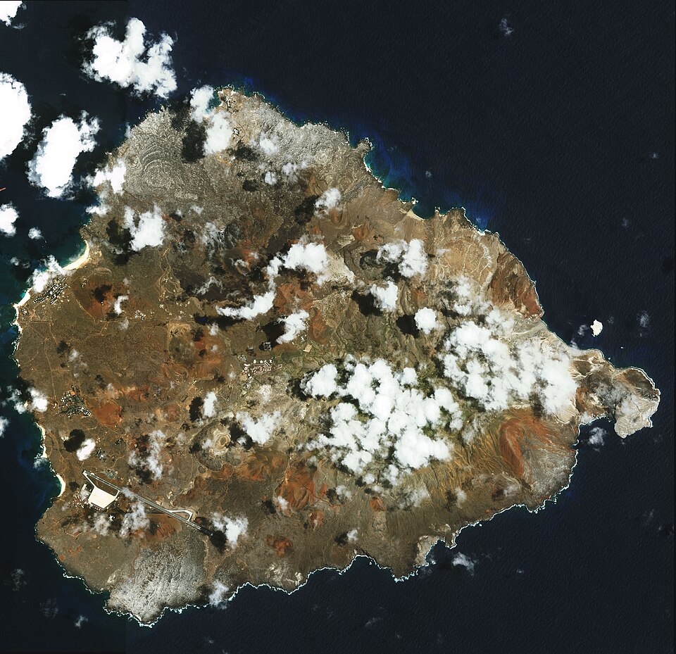 In the southern Atlantic Ocean roughly midway between central South America and central Africa, sits Ascension Island. A small, rocky, volcanic outcrop covered in many places by lava flows and cinder cones of dormant volcanoes, the island sits just west of the Mid-Atlantic Ridge. In this amazingly d