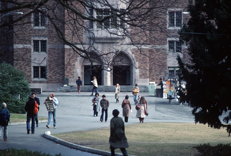People walking outside the Husky Union Building (student union), University of Washington, Seattle, Washington, U.S., 1979.