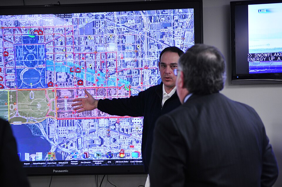 Washington, DC, January 19, 2009 -- FEMA's Chris Geldart, Director, Office of National Capital Region Coordination (NCRC), FEMA Headquarters, briefs the  Department of Homeland Security, Deputy Secretary, Paul Schneider, on security and safety measures in place for response as needed during the Pres