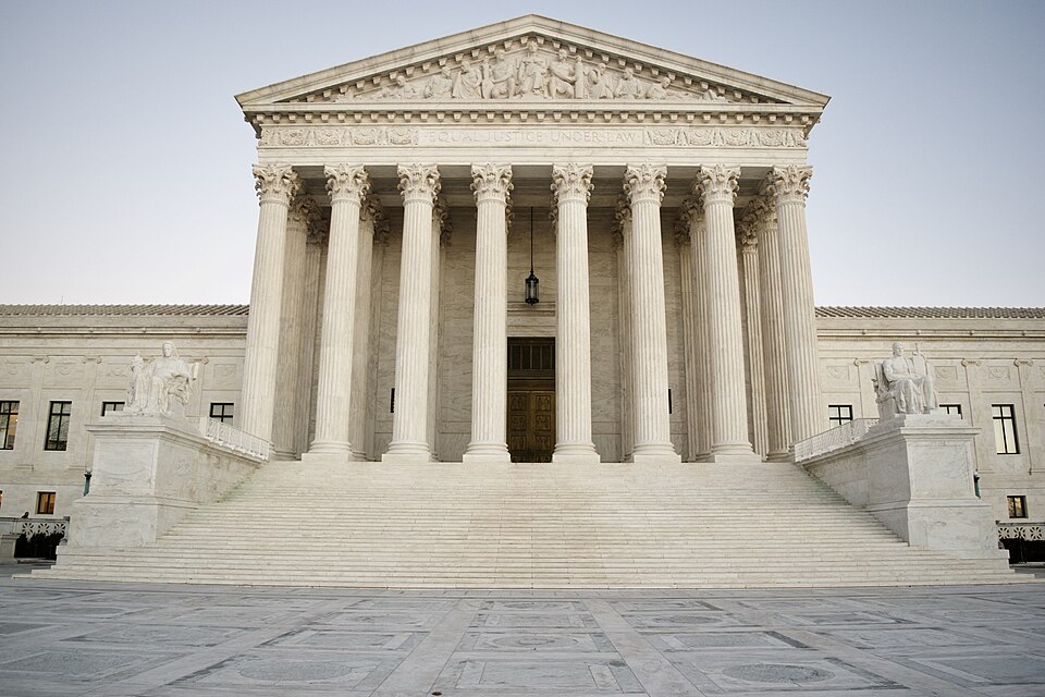500px provided description: The Front facade of the Supreme Court of the United States [#sky ,#travel ,#tourism ,#architecture ,#building ,#monument ,#steps ,#facade ,#outdoors ,#landmark ,#column ,#marble ,#sandstone ,#pillars ,#justice ,#courthouse ,#law ,#neoclassical ,#supreme court ,#no person 