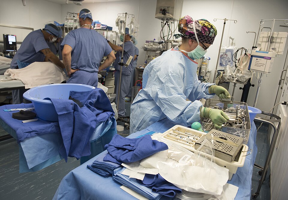 Staff Sgt. Brittany Vonoehmden, 455th Expeditionary Medical Group surgical technician, clears equipment from the surgical setup after a surgery, June 10, 2016, at Craig-Joint Theater Hospital, Bagram Airfield, Afghanistan. Sgt. Vonoehmden is one of many medical professionals that have rallied around