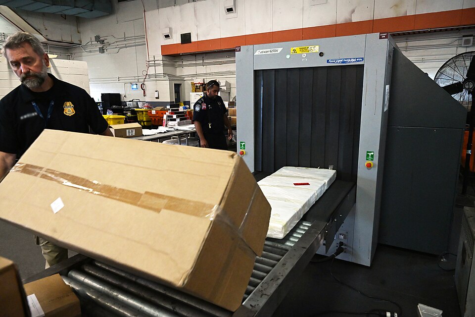 U.S. Customs and Border Protection (CBP) Office of Field Operations K9 Handlers inspects international arriving mail for counterfeit pharmaceuticals at the International Mail Facility at John. F. Kennedy International Airport in Queens, NY. Aug 08, 2024. Official CBP photo by Jaime Rodriguez Sr.