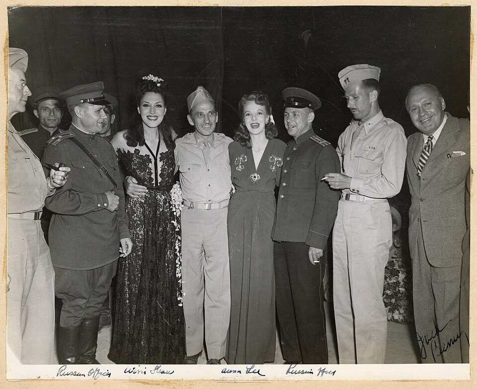 Jack Benny and Troupe [with Scott, US and Soviet officers, Wini Shaw, and Anna Lee].