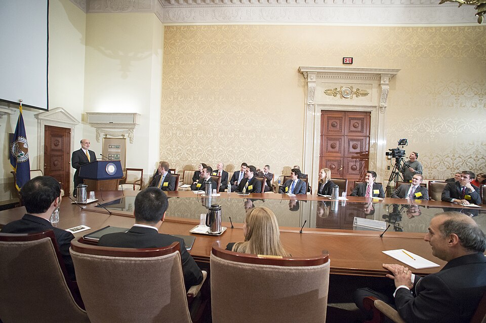 Chairman Ben S. Bernanke speaks to the 2012 College Fed Challenge Finalists. The finals were held in the Board Room at the Board of Governors on November 27, 2012. College Fed Challenge is a team competition for undergraduate students. Teams analyze economic and financial conditions and formulate a 