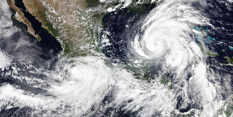 Hurricane Helene and Tropical Storm John together on September 25