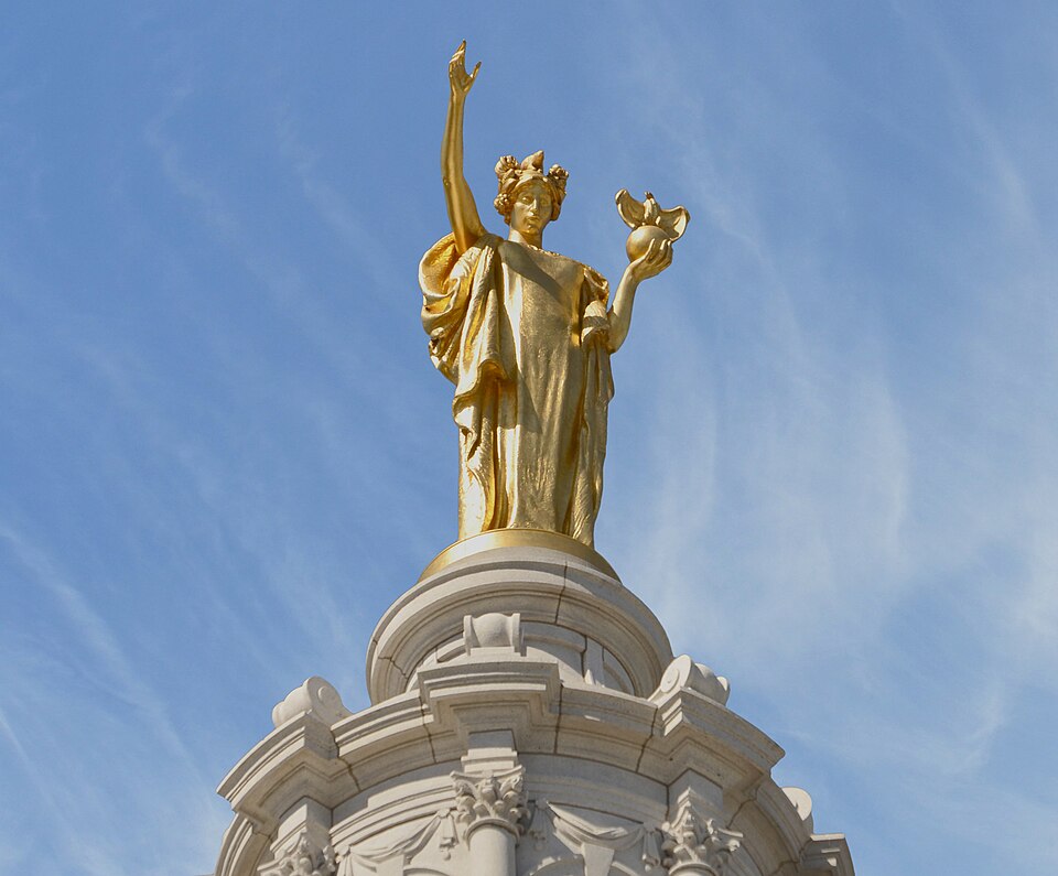 Gilded bronze statue titled Wisconsin, by Daniel Chester French, 1914, atop the dome of the Wisconsin State Capitol in Madison