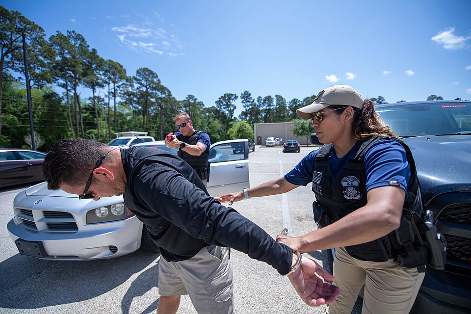 ICE Enforcement and Removal Operations (ERO) deportation officers conduct the simulated arrest of a suspect during vehicle-stop training at the Federal Law Enforcement Training Center (FLETC) in Glencoe Georgia on April 13, 2022.
Photo: Erica Knight/ICE