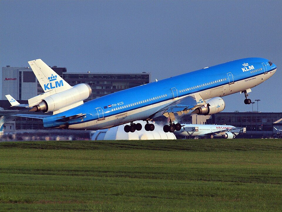 KLM MD-11 taking off on runway 24R